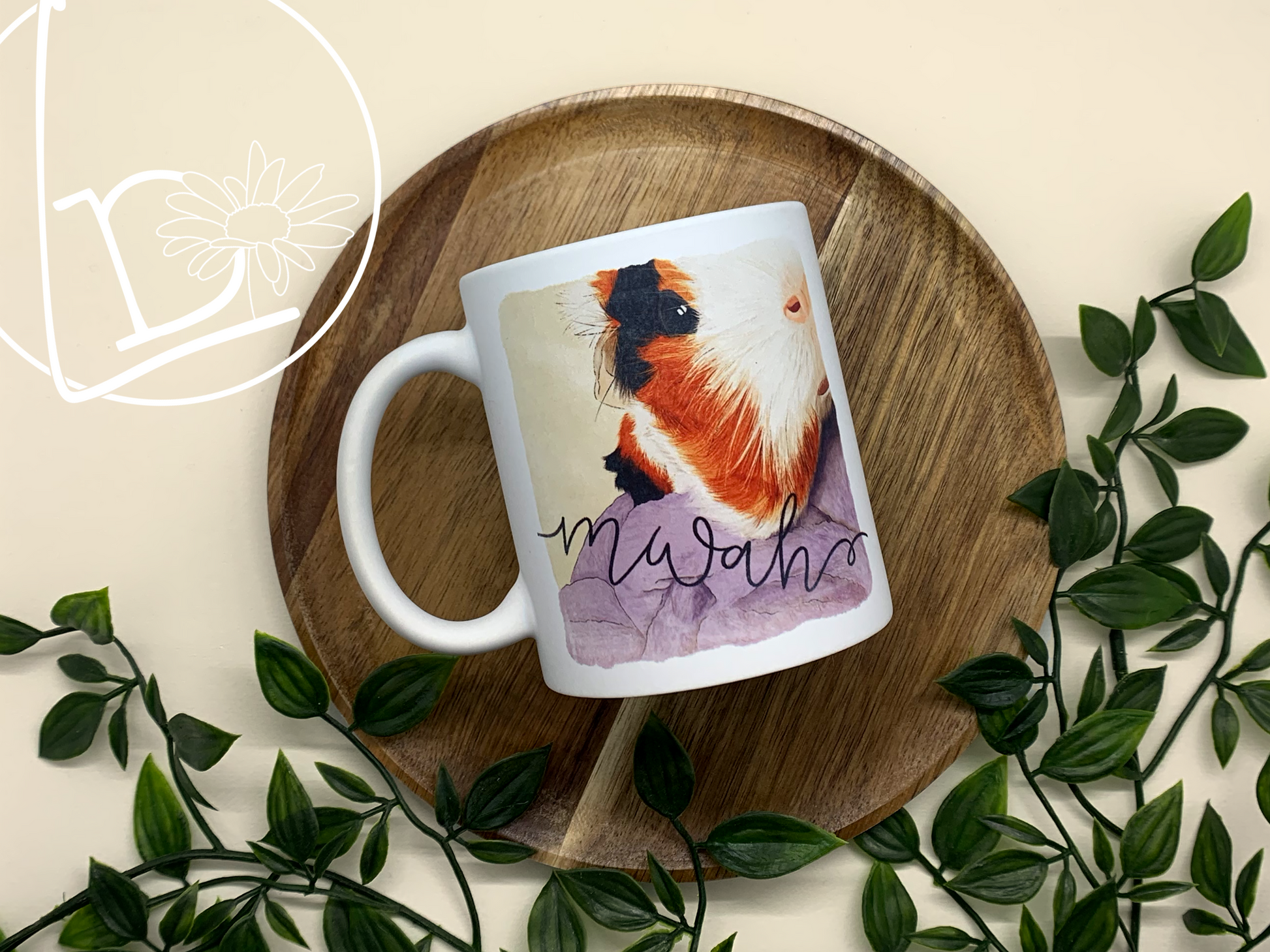 Illustrated mug of a black, white and ginger mug. The text says "mwah"