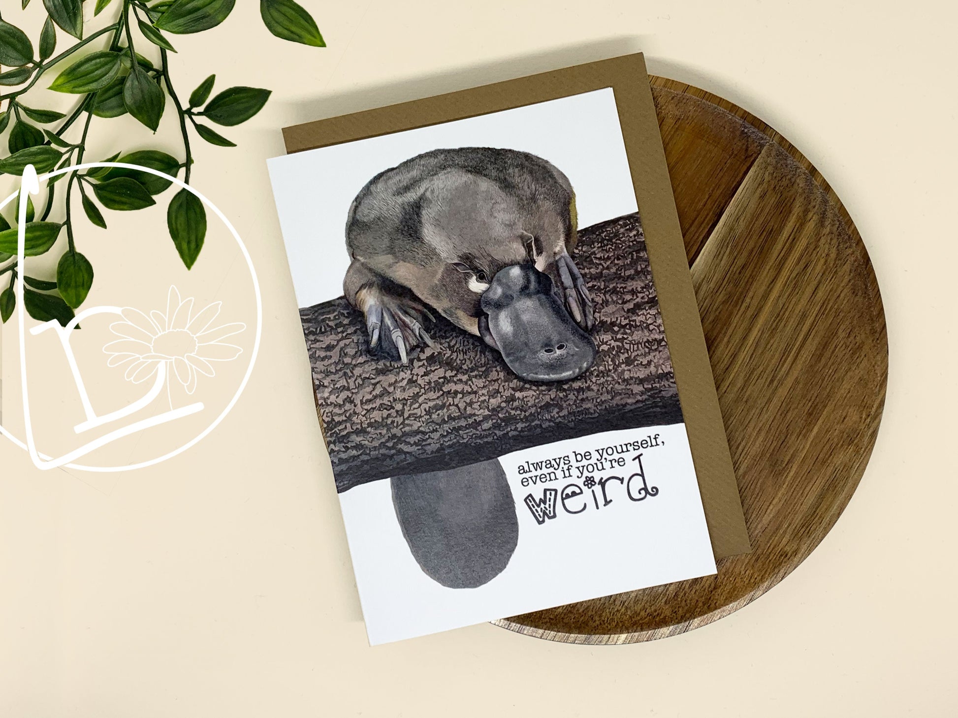 Illustrated platypus card. The text says "Always be yourself, even if you're weird."